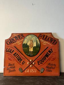 Panel publicitario de madera pintado a mano