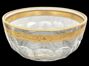 Copa de cristal tallado con borde de metal dorado grabado.