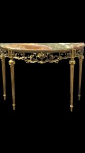 Consola de madera tallada y hoja de oro con motivos florales y rocalla. Encimera de mármol policromado. Periodo Art Nouveau.