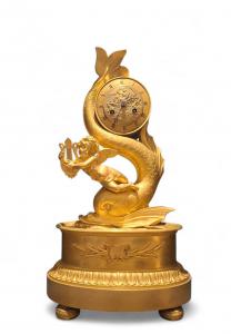 Reloj de bronce dorado