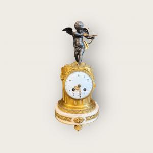 RELOJ CON PUTTO DORADO